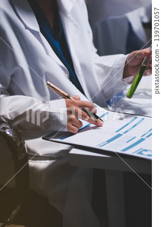 Researchers working in the clinical laboratory Researchers working in the clinical laboratory 139701057