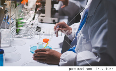 Researchers working in the clinical laboratory Researchers working in the clinical laboratory 139701067