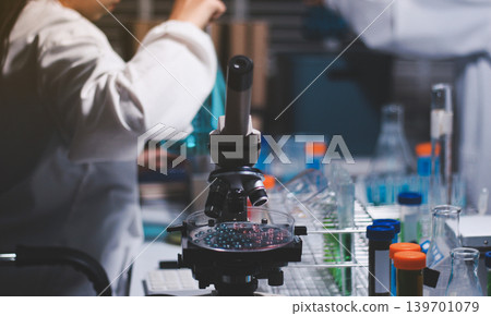 Researchers working in the clinical laboratory Researchers working in the clinical laboratory 139701079