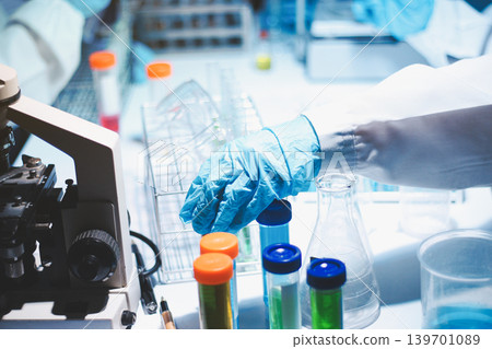 Researchers working in the clinical laboratory 139701089