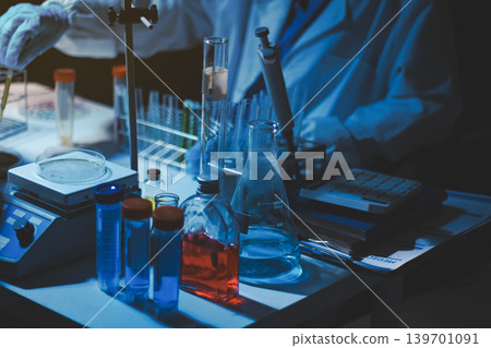 Researchers working in the clinical laboratory Researchers working in the clinical laboratory 139701091