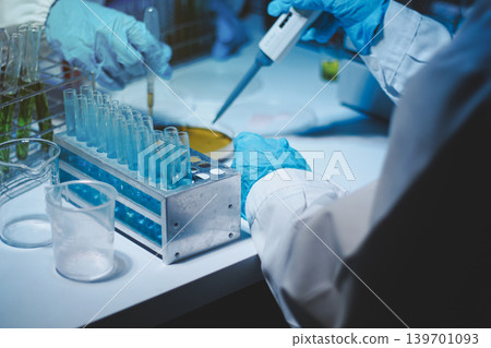 Researchers working in the clinical laboratory 139701093