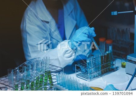 Researchers working in the clinical laboratory Researchers working in the clinical laboratory 139701094
