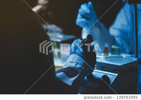 Researchers working in the clinical laboratory Researchers working in the clinical laboratory 139701095