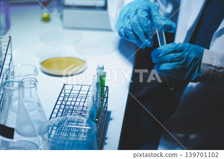 Researchers working in the clinical laboratory Researchers working in the clinical laboratory 139701102