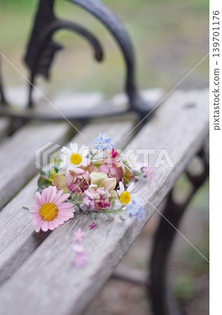 A bouquet on the bench A bouquet on the bench 139701176