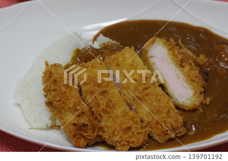 Curry with a large pork cutlet Curry with a large pork cutlet 139701192