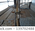 Clamps for the frame bracing of temporary scaffolding at industrial tank construction sites. 139702488