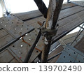 Clamps for the frame bracing of temporary scaffolding at industrial tank construction sites. 139702490