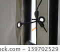 Securing the sheets on the temporary scaffolding 139702529