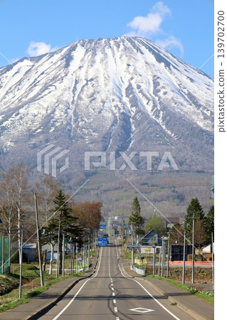 In early May, in springtime in Hokkaido, from Makari Village in Abuta District, which has been selected as one of Japan's 100 Villages to Preserve, one can see Mount Yotei, also known as Ezo Fuji, in its springtime glory. In early May, in springtime in Hokkaido, from Makari Village in Abuta District, which has been selected as one of Japan's 100 Villages to Preserve, one can see Mount Yotei, also known as Ezo Fuji, in its springtime glory. 139702700