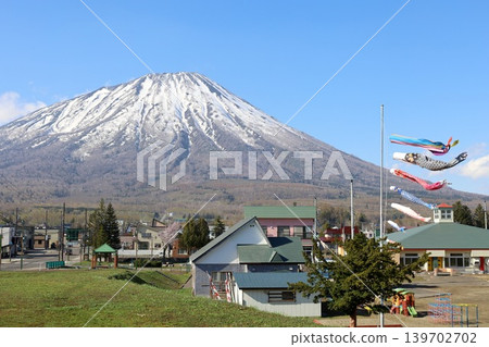 In early May, in springtime in Hokkaido, from Makari Village in Abuta District, which has been selected as one of Japan's 100 Villages to Preserve, one can see Mount Yotei, also known as Ezo Fuji, in its springtime glory. In early May, in springtime in Hokkaido, from Makari Village in Abuta District, which has been selected as one of Japan's 100 Villages to Preserve, one can see Mount Yotei, also known as Ezo Fuji, in its springtime glory. 139702702