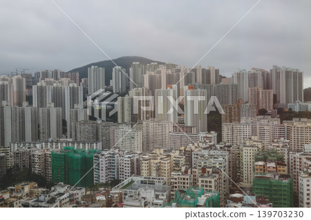 May 16 2026 Kwun Tong skyline dense residential towers under cloudy sky 139703230