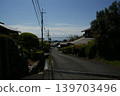 A deserted alley overlooking the sea at sunset 139703496