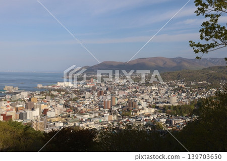 May in Hokkaido, Otaru, Otaru City, Otaru, a pilgrimage site for manga and anime fans, a view of Otaru cityscape from Asahi Observatory in May. May in Hokkaido, Otaru, Otaru City, Otaru, a pilgrimage site for manga and anime fans, a view of Otaru cityscape from Asahi Observatory in May. 139703650