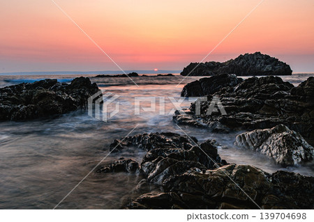 A tranquil morning scene of Tashiro Beach, captured with long exposure. A tranquil morning scene of Tashiro Beach, captured with long exposure. 139704698