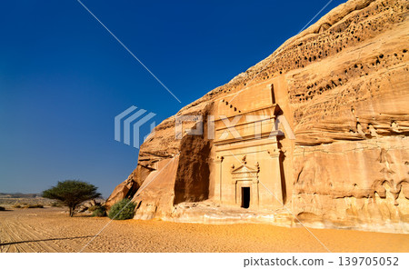 Ancient Nabatean tomb carved into rock at Hegra Ancient Nabatean tomb carved into rock at Hegra 139705052
