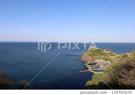 A view of the Sea of Japan from the Shukutsu Panorama Observatory in Otaru City, Hokkaido, in early May, with a spring ferry sailing offshore. A view of the Sea of Japan from the Shukutsu Panorama Observatory in Otaru City, Hokkaido, in early May, with a spring ferry sailing offshore. 139705070