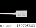 Close-up White Switch And  Plug isolated on black background with copy space 139705383