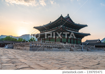 Seoul, South Korea - May. 14, 2026 : Majestic Geunjeongjeon Hall in Gyeongbokgung Palace under warm late afternoon sunlight, Seoul, South Korea Seoul, South Korea - May. 14, 2026 : Majestic Geunjeongjeon Hall in Gyeongbokgung Palace under warm late afternoon sunlight, Seoul, South Korea 139705471