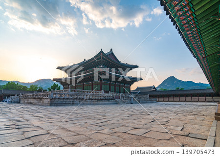 Seoul, South Korea - May. 14, 2026 : Majestic Geunjeongjeon Hall in Gyeongbokgung Palace under warm late afternoon sunlight, Seoul, South Korea Seoul, South Korea - May. 14, 2026 : Majestic Geunjeongjeon Hall in Gyeongbokgung Palace under warm late afternoon sunlight, Seoul, South Korea 139705473