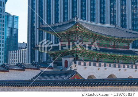 Seoul, South Korea - May. 14, 2026 : Historical Gwanghwamun Gate surrounded by modern skyscrapers and Bugaksan Mountain in Seoul, South Korea Seoul, South Korea - May. 14, 2026 : Historical Gwanghwamun Gate surrounded by modern skyscrapers and Bugaksan Mountain in Seoul, South Korea 139705827