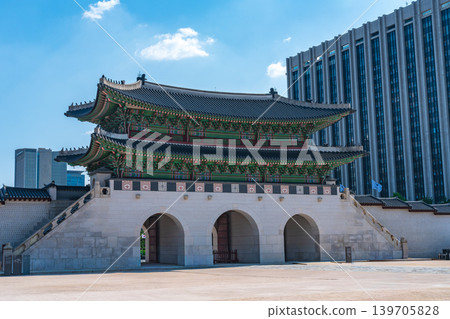 Seoul, South Korea - May. 14, 2026 : Historical Gwanghwamun Gate surrounded by modern skyscrapers and Bugaksan Mountain in Seoul, South Korea Seoul, South Korea - May. 14, 2026 : Historical Gwanghwamun Gate surrounded by modern skyscrapers and Bugaksan Mountain in Seoul, South Korea 139705828