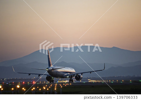 Sendai Airport at dusk, plane taxiing, Natori City, Miyagi Prefecture Sendai Airport at dusk, plane taxiing, Natori City, Miyagi Prefecture 139706333