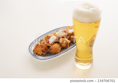 The perfect combination: beer and fried octopus The perfect combination: beer and fried octopus 139706702