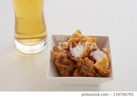 The perfect combination: beer and fried octopus The perfect combination: beer and fried octopus 139706705