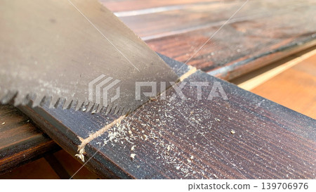 Wood and saw for DIY projects Wood and saw for DIY projects 139706976