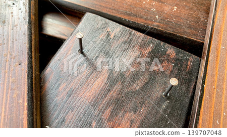 Exposed nails and wood surface Exposed nails and wood surface 139707048