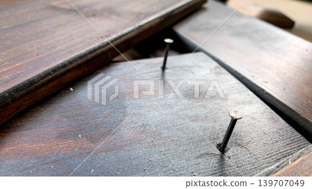 Exposed nails and wood surface Exposed nails and wood surface 139707049