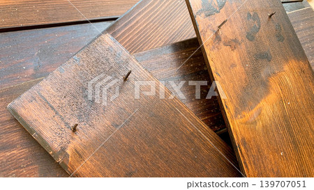 Exposed nails and wood surface Exposed nails and wood surface 139707051