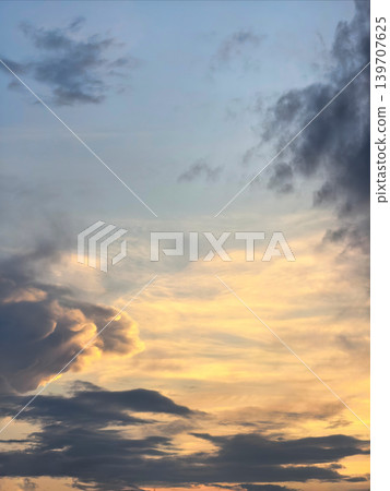 Soft Sunset Clouds Across Calm Evening Sky Soft Sunset Clouds Across Calm Evening Sky 139707625