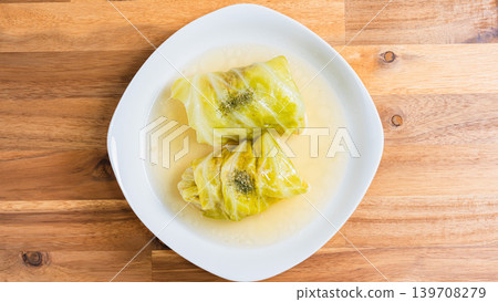 Cabbage rolls placed on a wooden table Cabbage rolls placed on a wooden table 139708279