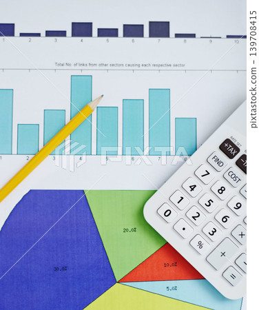 Statistics, calculator and documents or background for data analytics, financial review and planning of revenue, profit or sales. Pie chart, graphs and charts or numbers in accounting, math or budget Statistics, calculator and documents or background for data analytics, financial review and planning of revenue, profit or sales. Pie chart, graphs and charts or numbers in accounting, math or budget 139708415