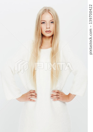 Blonde woman, portrait and fashion in confidence for natural beauty in haircare, cosmetics or makeup on a white studio background. Face of young female person or attractive model in stylish outfit Blonde woman, portrait and fashion in confidence for natural beauty in haircare, cosmetics or makeup on a white studio background. Face of young female person or attractive model in stylish outfit 139708422