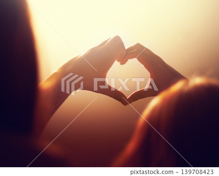 Concert, night and hands of people with heart for support from fan in celebration of music, festival and event. Party, love and person with emoji, sign and gesture for care at rave with light Concert, night and hands of people with heart for support from fan in celebration of music, festival and event. Party, love and person with emoji, sign and gesture for care at rave with light 139708423