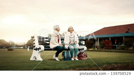 Talking, senior friends and at a club for sports, fitness break and sitting together after exercise. Happy, relax and elderly women on a field bench for conversation, retirement hobby or activity Talking, senior friends and at a club for sports, fitness break and sitting together after exercise. Happy, relax and elderly women on a field bench for conversation, retirement hobby or activity 139708529