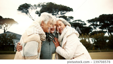 Talking, laughing and elderly woman friends outdoor in a park together for bonding during retirement. Happy, smile and funny with a group of senior people hugging in a garden for humor or fun Talking, laughing and elderly woman friends outdoor in a park together for bonding during retirement. Happy, smile and funny with a group of senior people hugging in a garden for humor or fun 139708578
