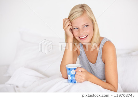 Happy woman, thinking and relax in bed with coffee and wake up with ideas for morning for future. Healthy, person and girl with tea in bedroom on holiday, vacation or wellness from rest in apartment Happy woman, thinking and relax in bed with coffee and wake up with ideas for morning for future. Healthy, person and girl with tea in bedroom on holiday, vacation or wellness from rest in apartment 139708743