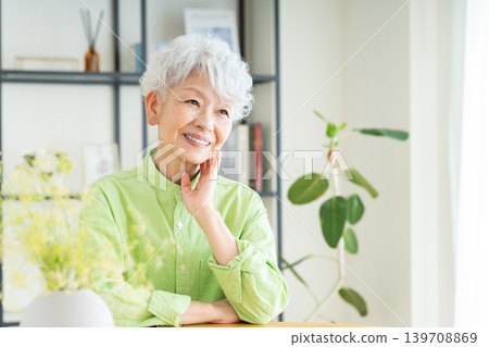 Senior woman relaxing at home Senior woman relaxing at home 139708869
