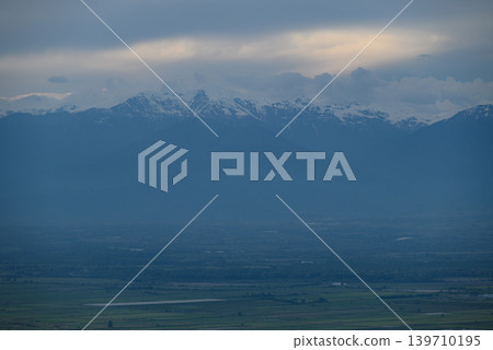 Alazani Valley and Greater Caucasus mountain range in Sighnaghi town, Kakheti region of Georgia Alazani Valley and Greater Caucasus mountain range in Sighnaghi town, Kakheti region of Georgia 139710195
