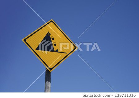 Signs of falling rock attention Signs of falling rock attention 139711330