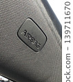 Textured black car seat with raised airbag label 139711670