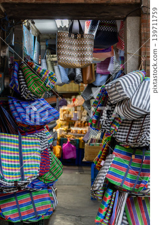 Colorful fisherman's net bags lined up in Dihua Street, Taipei, Taiwan. Colorful fisherman's net bags lined up in Dihua Street, Taipei, Taiwan. 139711759