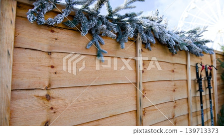 old wooden fence with a flower old wooden fence with a flower 139713373