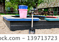 Toy Bucket and Shovel on Playground Sandbox Edge 139713723