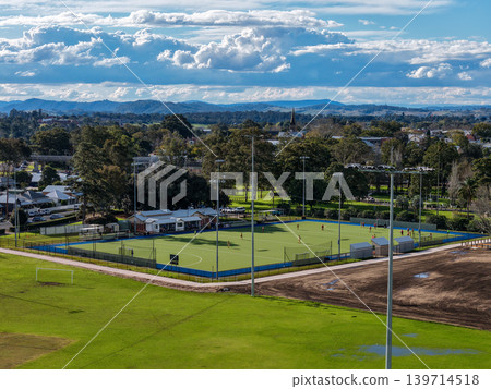 Aerial drone view of sports complex in Maitland Park, Maitland, New South Wales, Australia showing multiple playing fields and recreational facilities. Aerial drone view of sports complex in Maitland Park, Maitland, New South Wales, Australia showing multiple playing fields and recreational facilities. 139714518